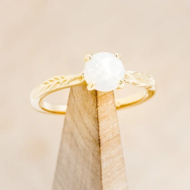 "HOPE" - ROUND CUT OPAL SOLITAIRE ENGAGEMENT RING WITH FEATHER ACCENTS